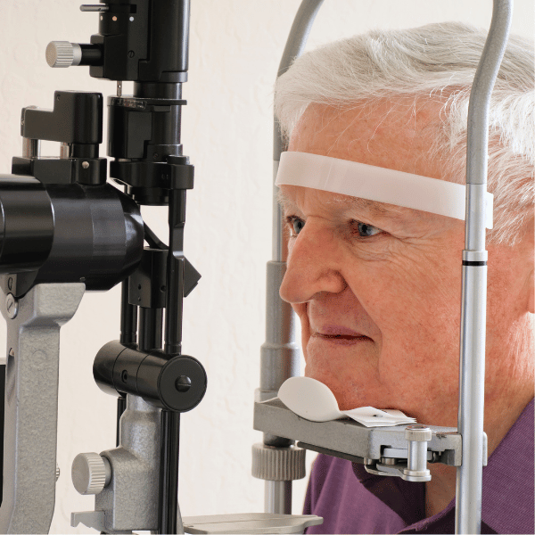 Senior man getting an eye exam