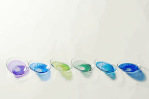 Row of colored contacts on a white table