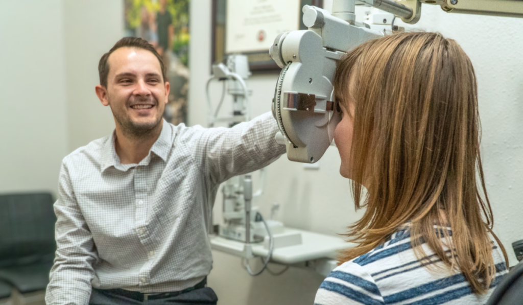 Dr. Ball doing an eye exam with a patient